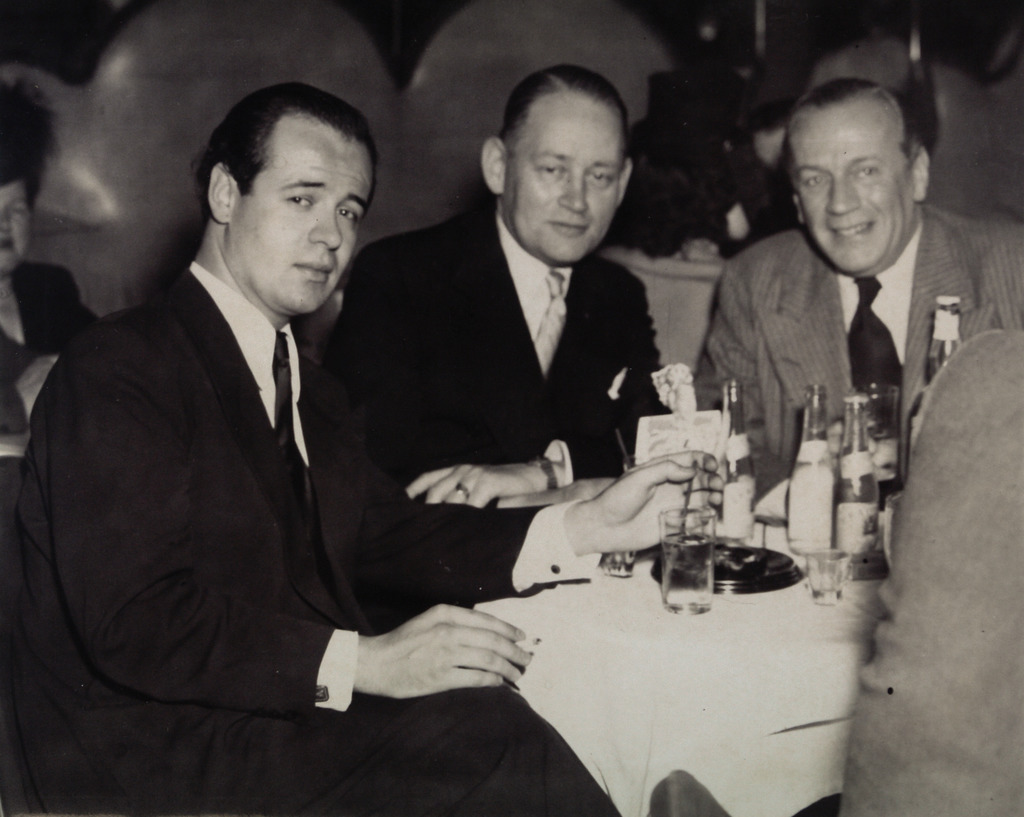 Freddy with Heineken director D.U. Stikker and actor/director Cees Laseur in the New York Copacabana nightclub, 1946